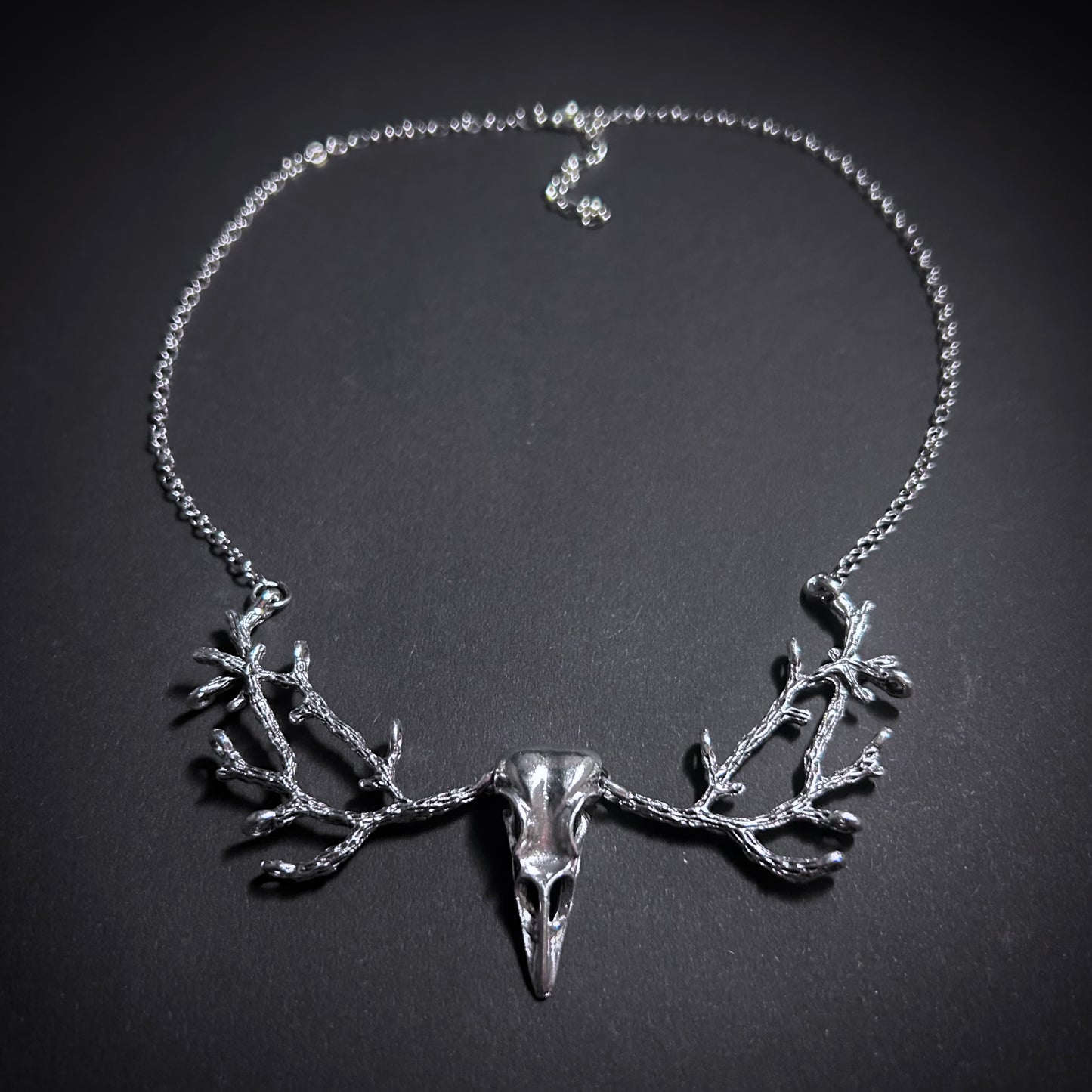 Raven Skull & Branch Silver Necklace