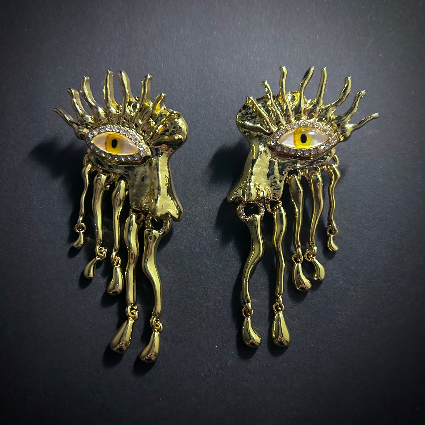 Yellow Eye Dripping Metal Fringe, Gold & Rhinestones Surrealist Earrings