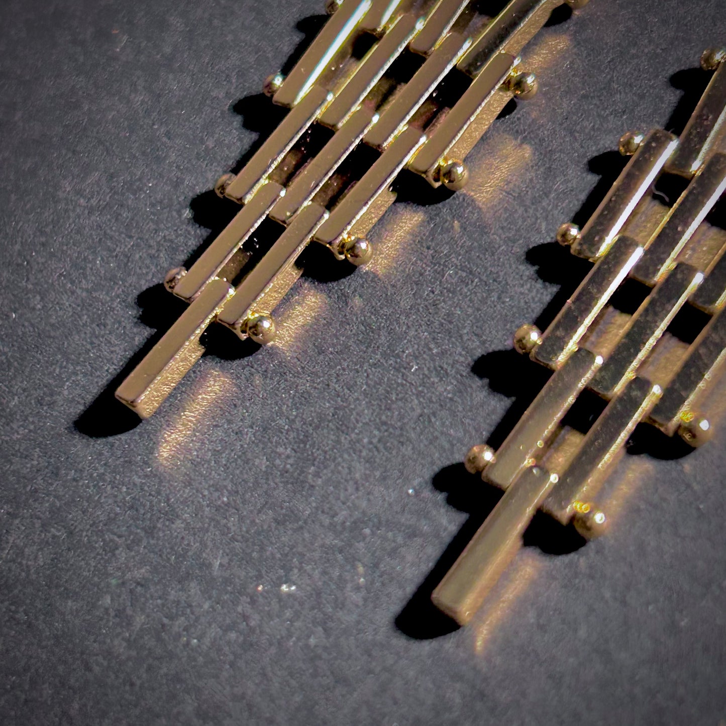 Geometric Hinged Six Level Earrings in Gold